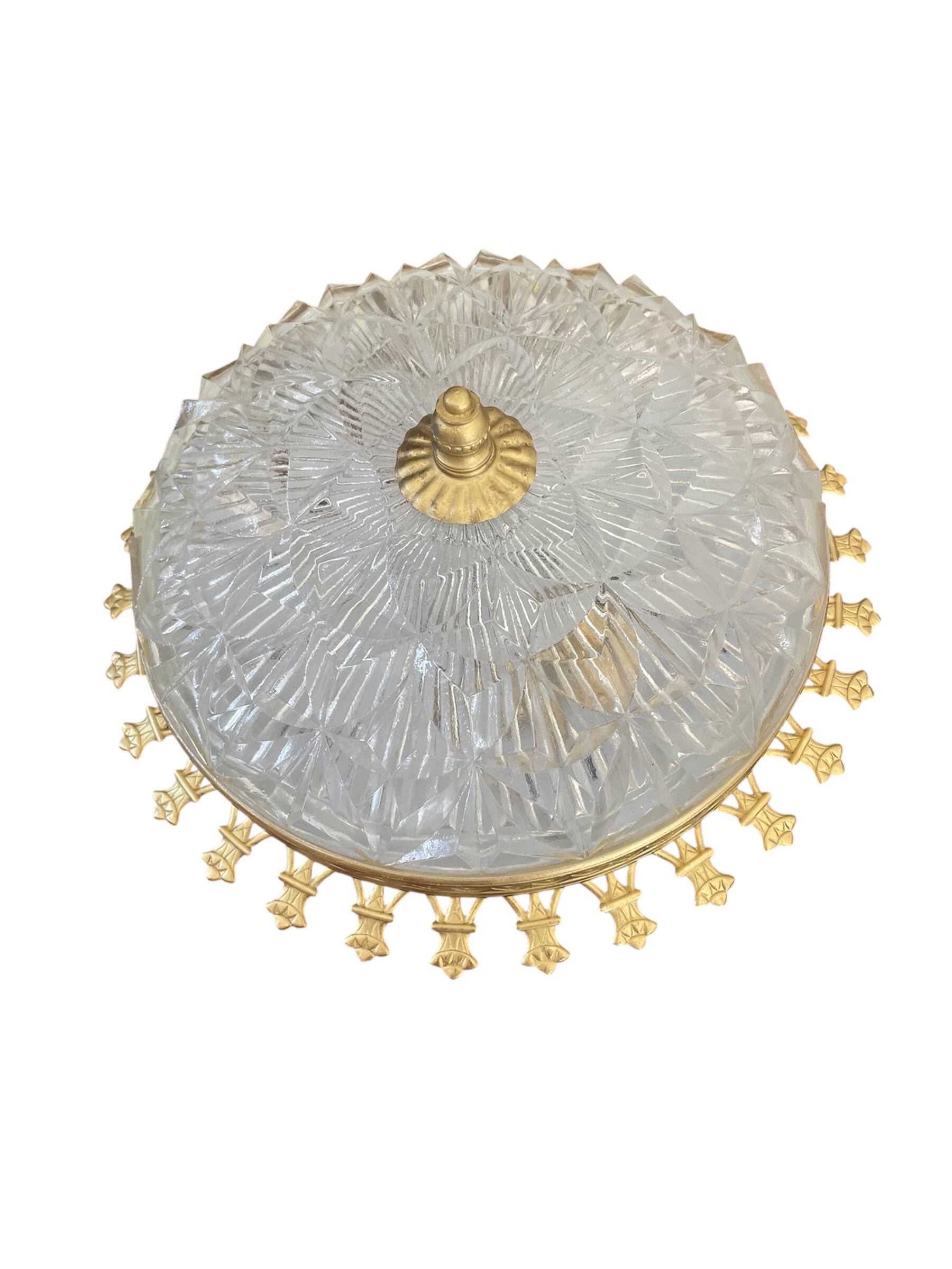 Vintage ceiling light with cut glass and gold metal.