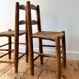 Brutalist chairs made of wood and straw