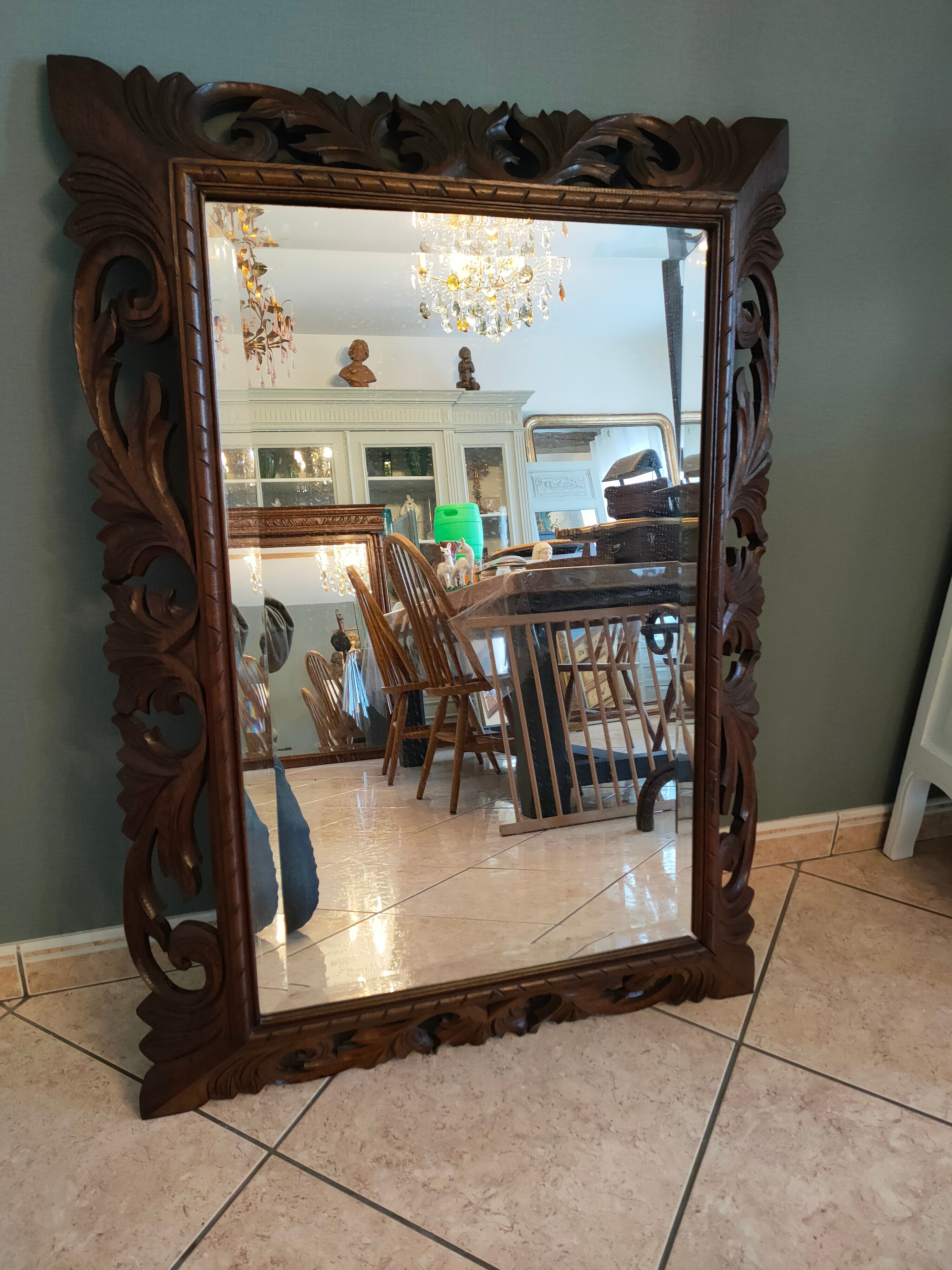 Antique mirror in openwork carved wood