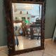 Antique mirror in openwork carved wood