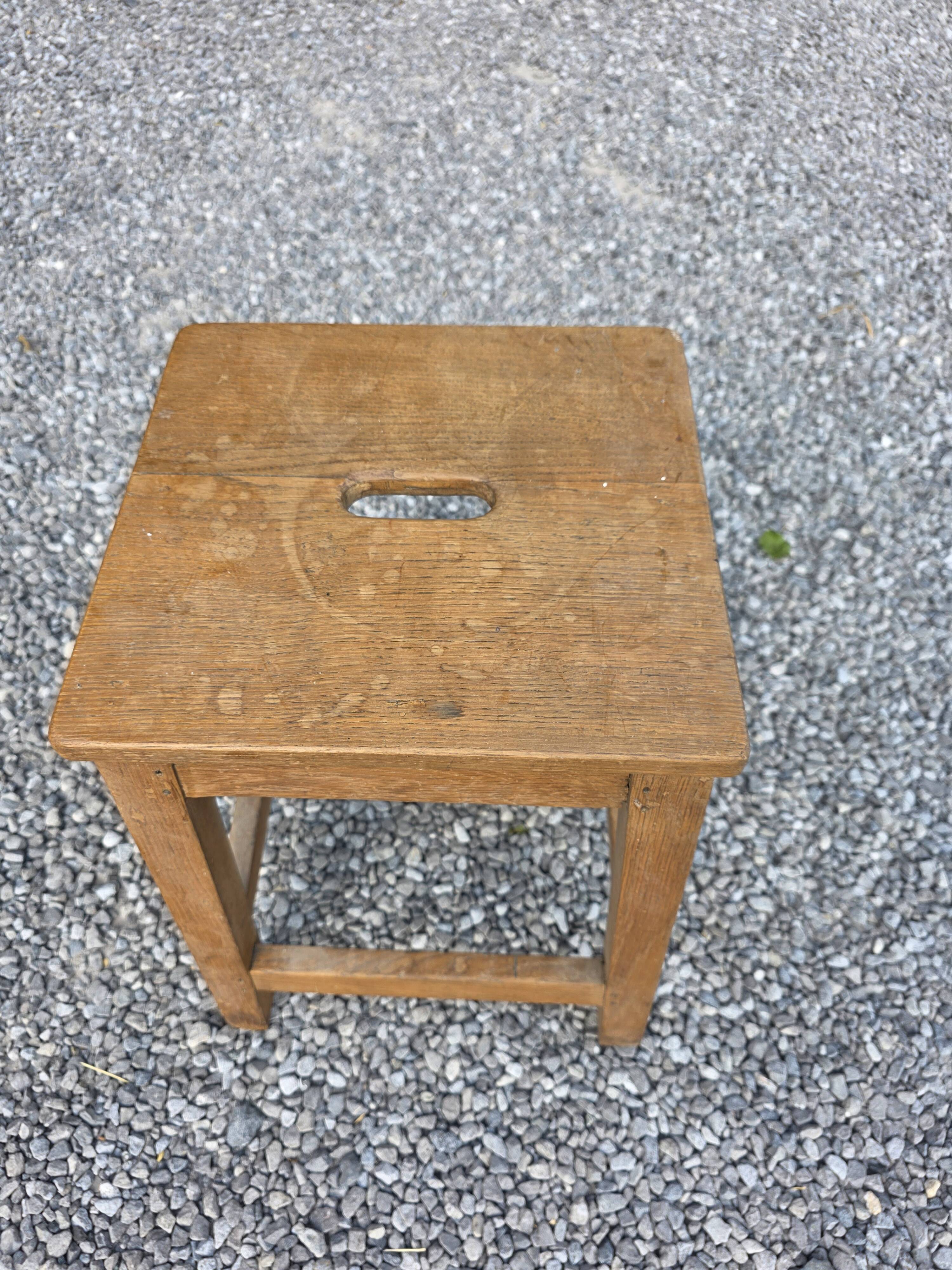 Pair of low stools in solid oak