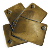 Empty pocket square of aces in brass