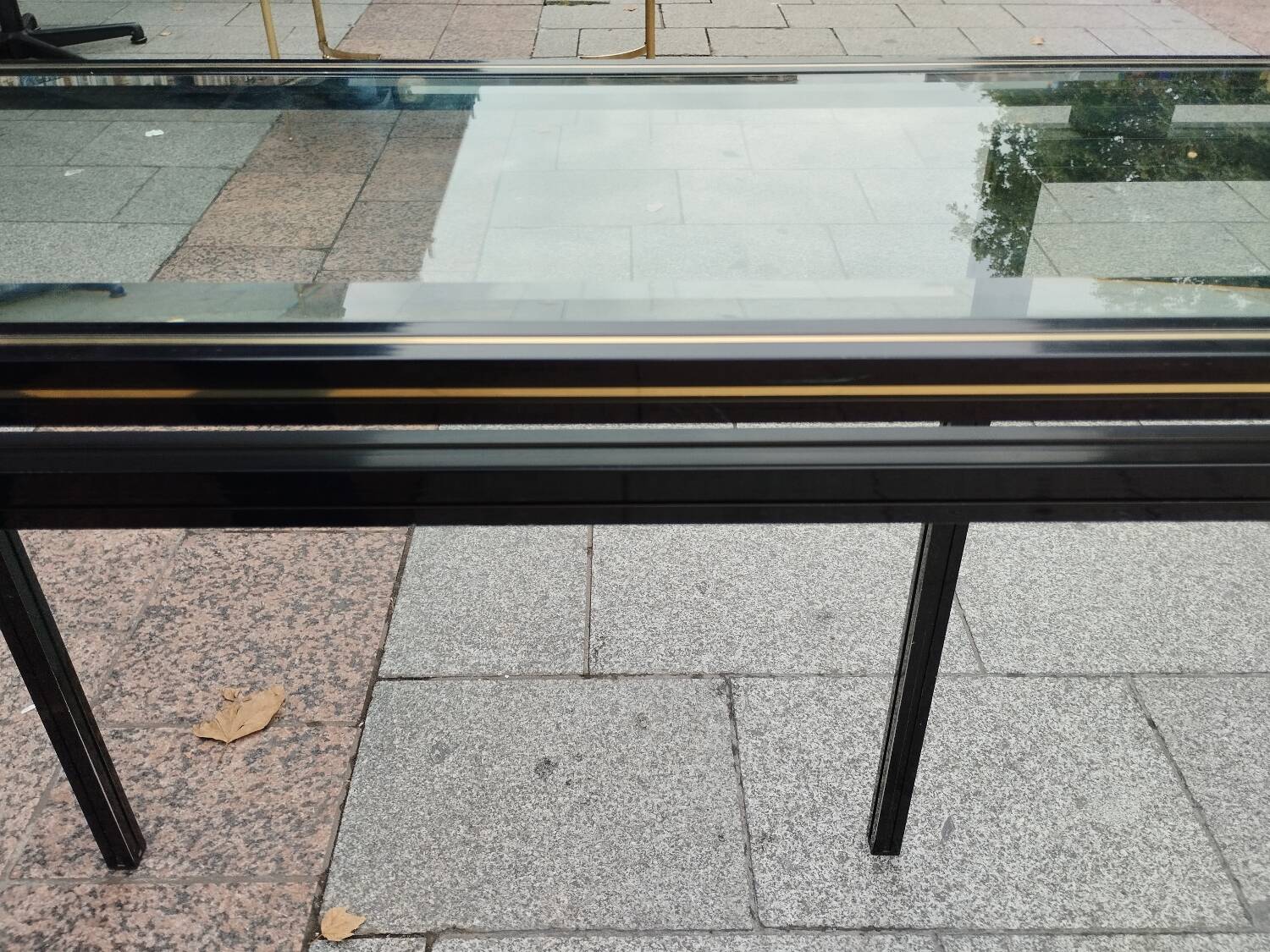 Old console with vintage glass top