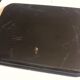 Black wooden tray with gilding and Russian motifs painted with red and green flowers