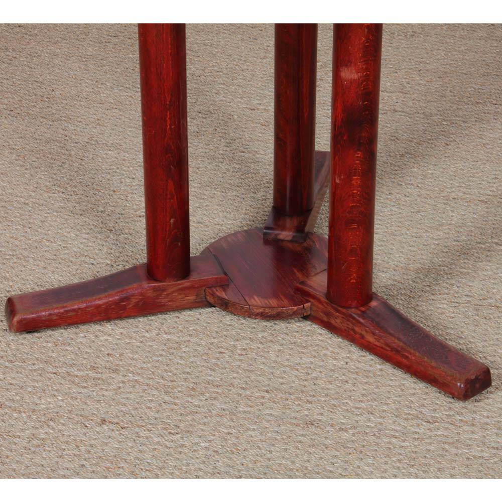 Round wooden dining table from the 1980s.