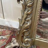 Miroir époque Napoléon III à fronton à la feuille d'or