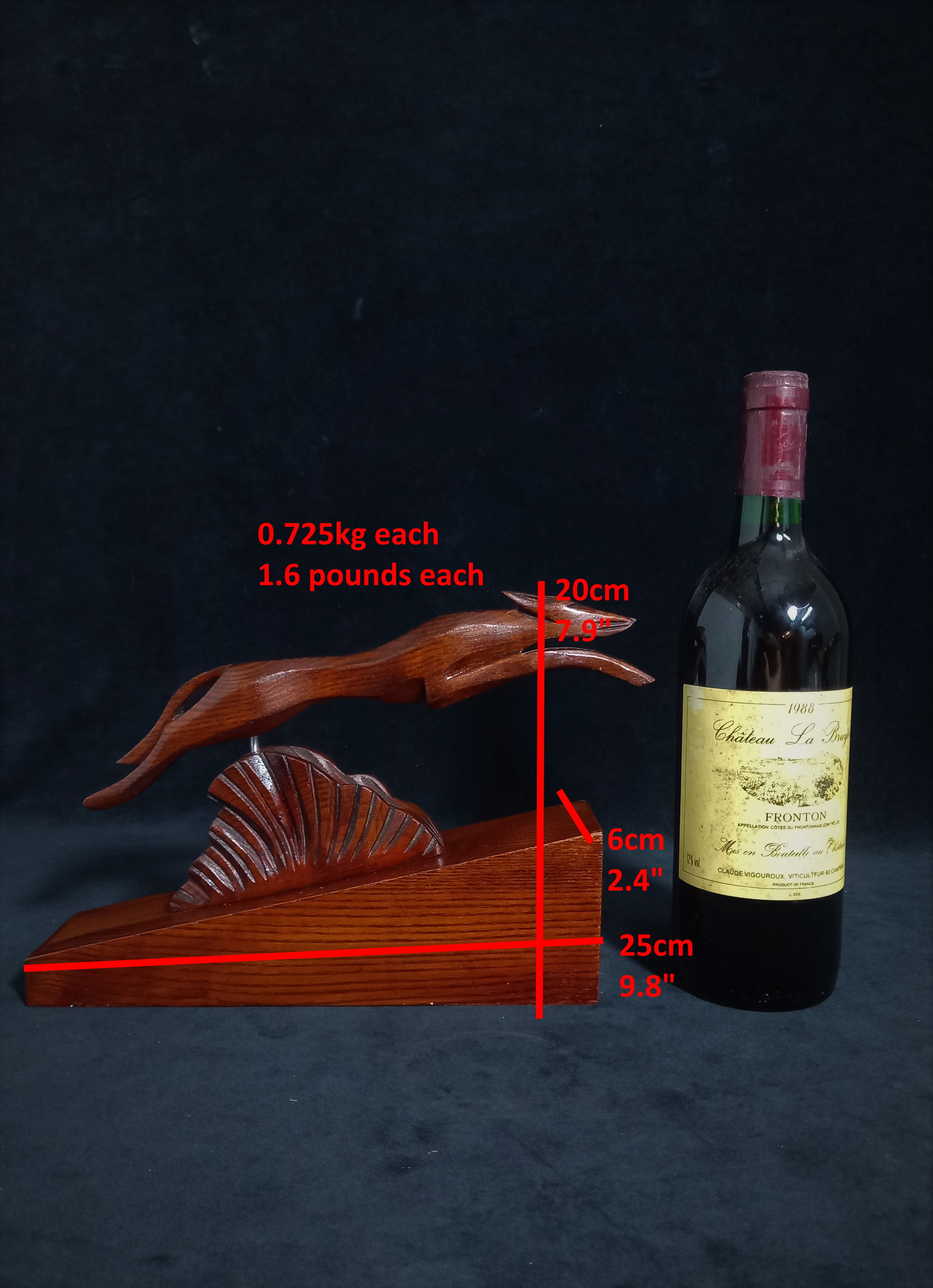 Pair of art deco wooden bookends with greyhounds