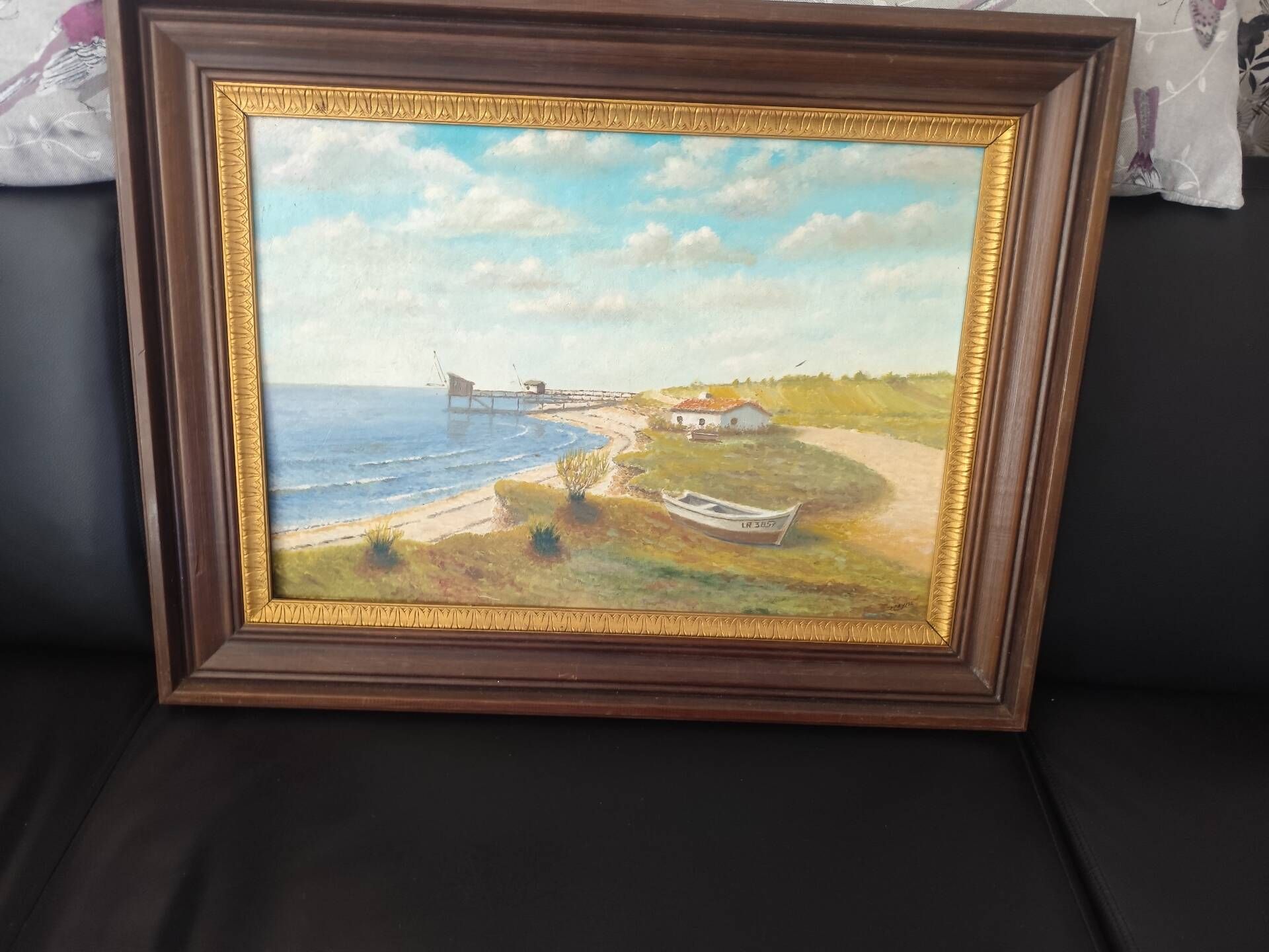 Beautiful painted picture depicting a seaside landscape.