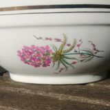 Porcelain gravy boat from the Orchies Moulin des Loups earthenware factory with lilac decoration