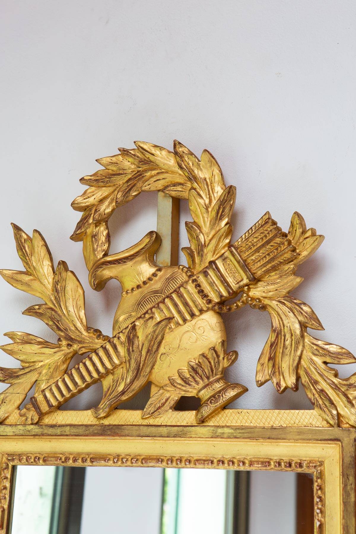 French gold mirror with a Louis XVI style pediment c. 1940/50 (95*54 cm)
