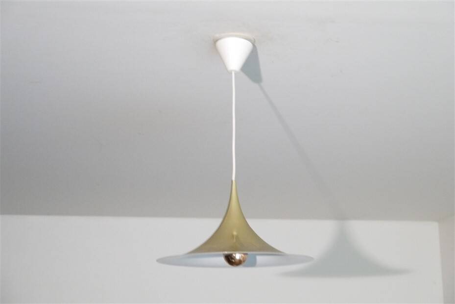 Semi pendulum pendant lamp by Thorup and Bonderup in brass