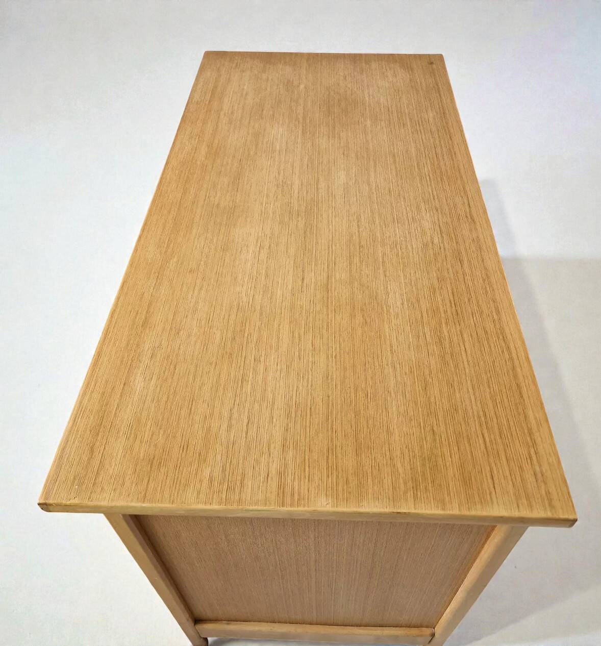 Commode style with rounded edges.