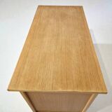 Commode style with rounded edges.