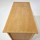 Commode style with rounded edges.