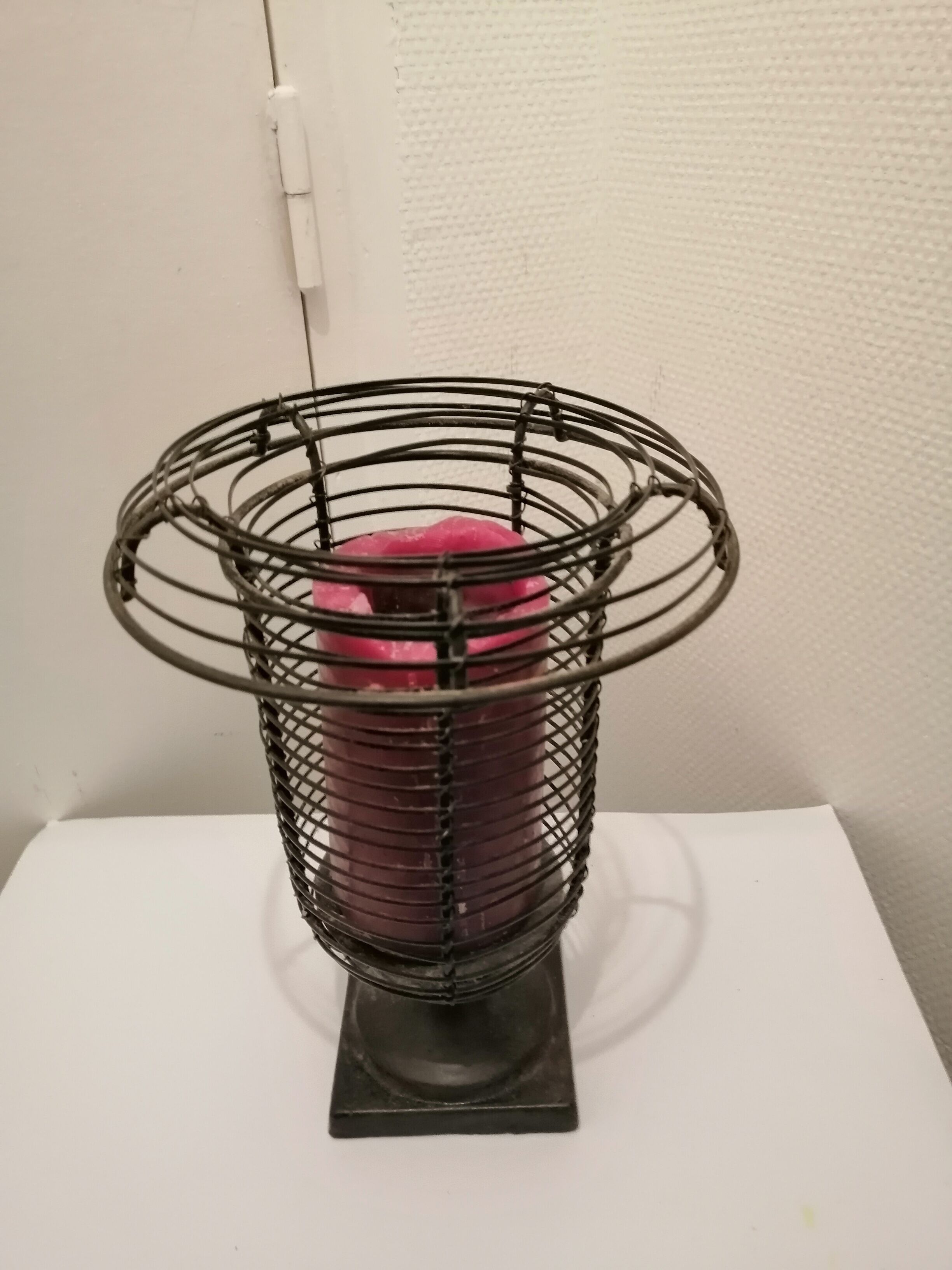 Wrought iron candle holder