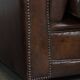 2 Chesterfield armchairs in dark brown cowhide
