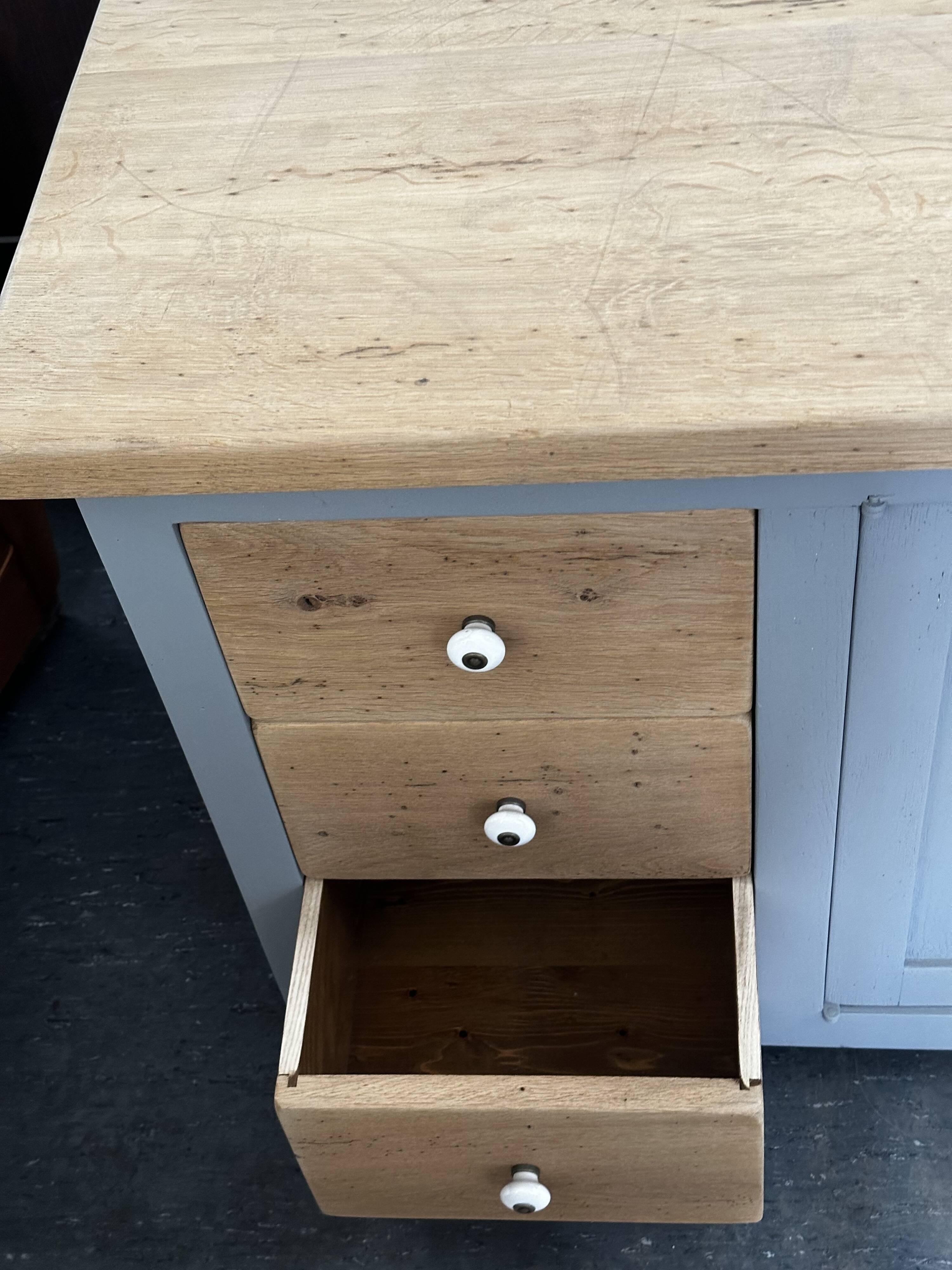 Vintage sideboard painted in gray and raw wood
