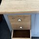 Vintage sideboard painted in gray and raw wood