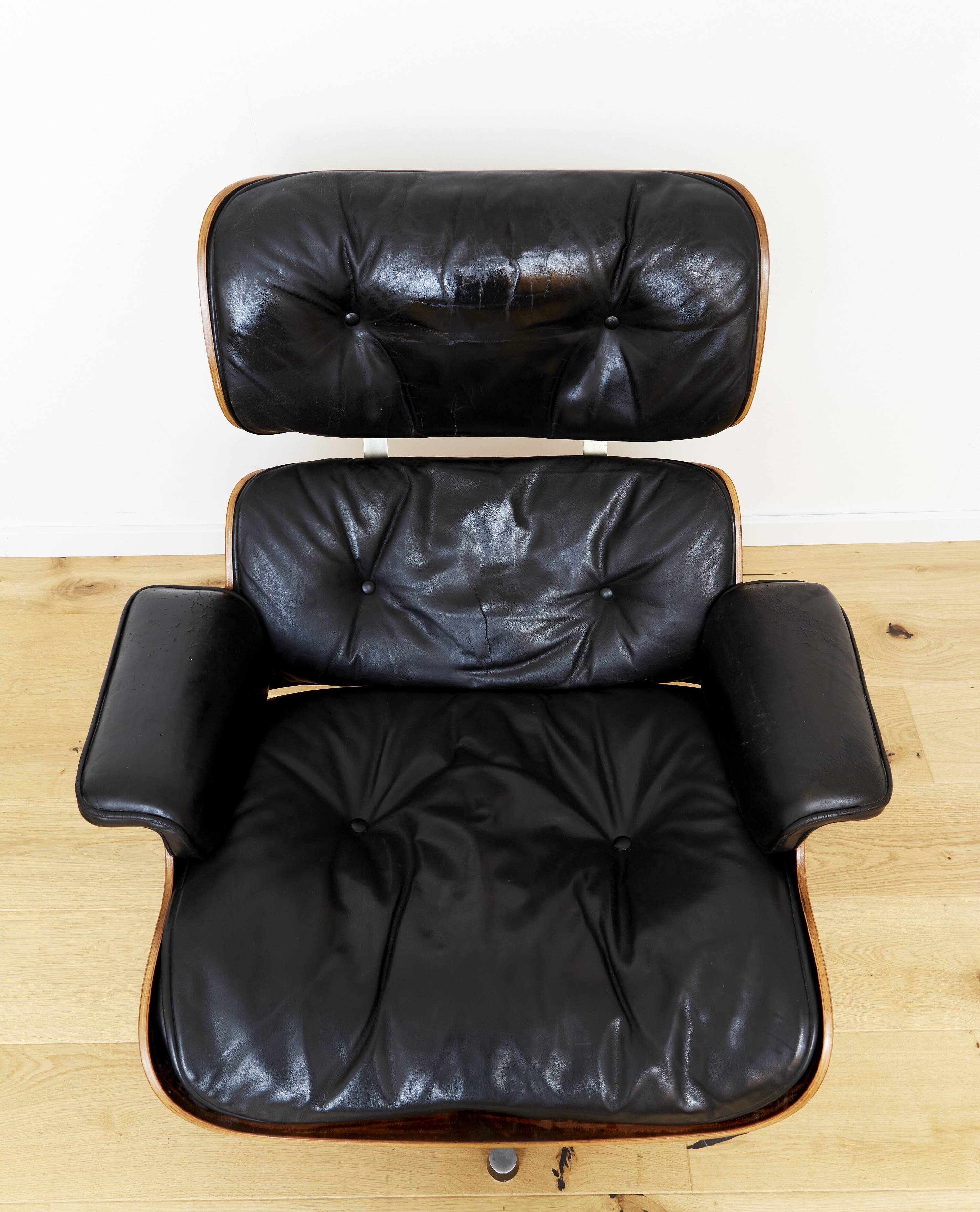 Fauteuil et pouf Charles & Ray Eames pour Herman Miller