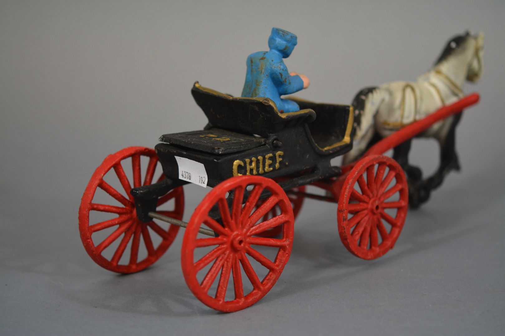 Old toy Horse-drawn carriage in cast iron polychrome iron with checker "P.D. CHIEF"