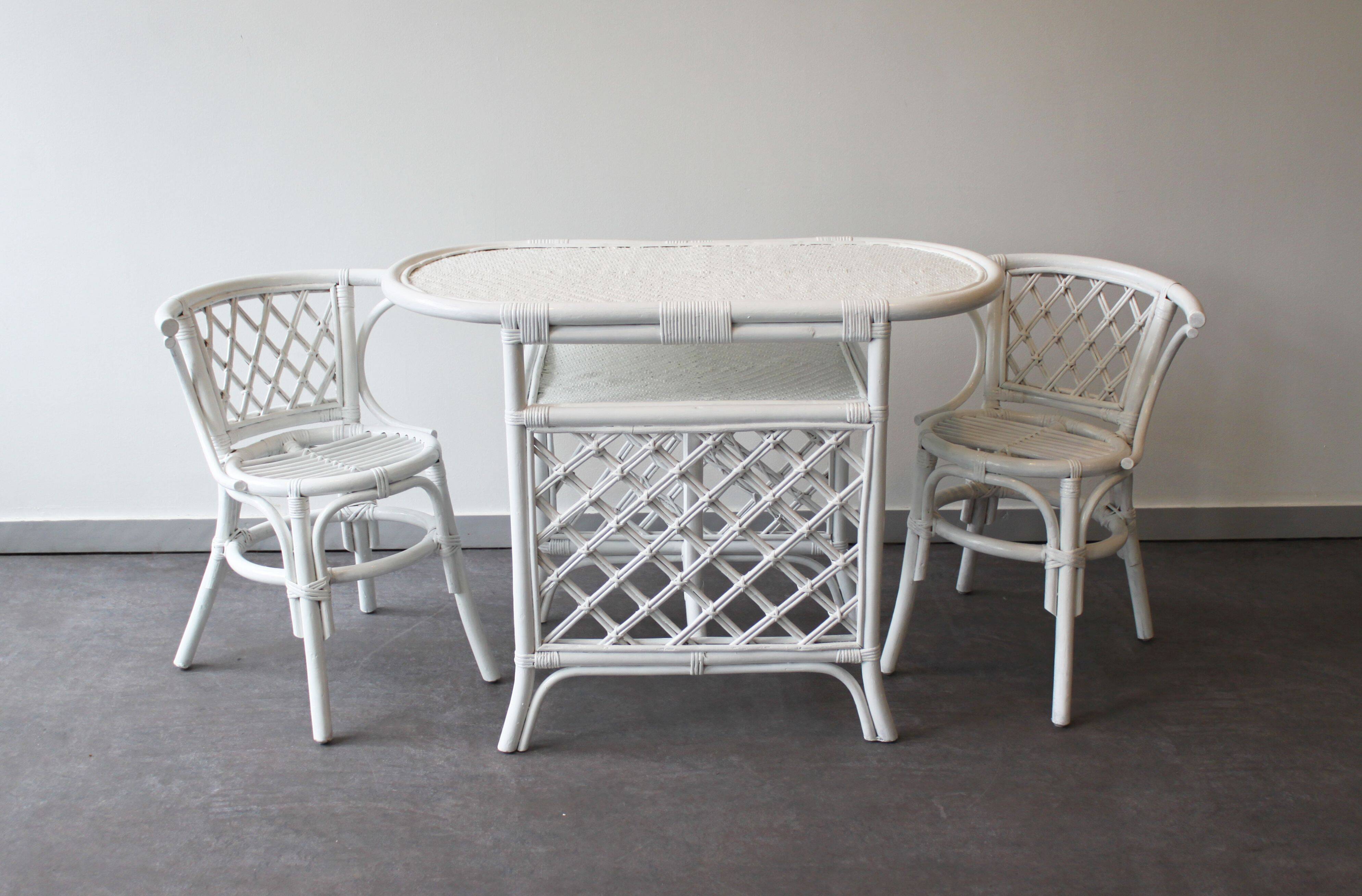 White rattan table and chairs set.