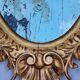 Large oval gold mirror, Louis XV rococo style, late 19th century, 114 x 66 cm.