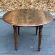 Table ovale à volets extensible Louis Philippe en bois massif du XIXème