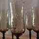 8 vintage smoked champagne flutes with black feet Arcoroc