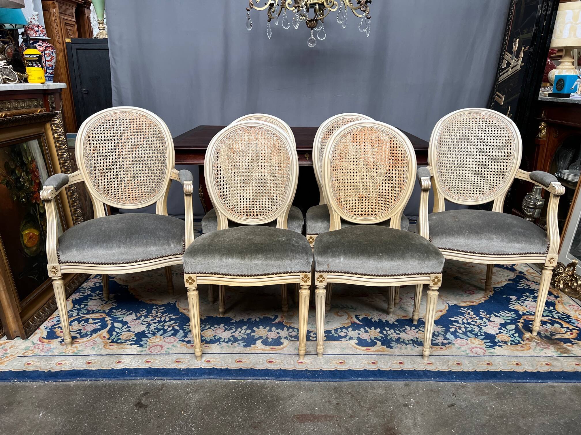 Set of four Louis XVI style chairs and two armchairs.