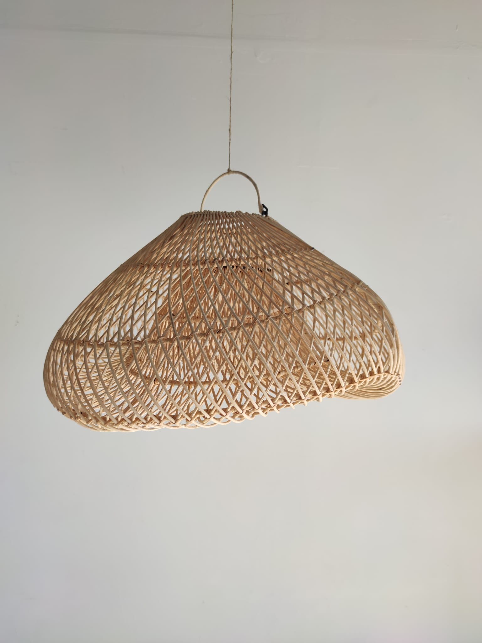 Small rattan lampshade in the shape of a braided hat