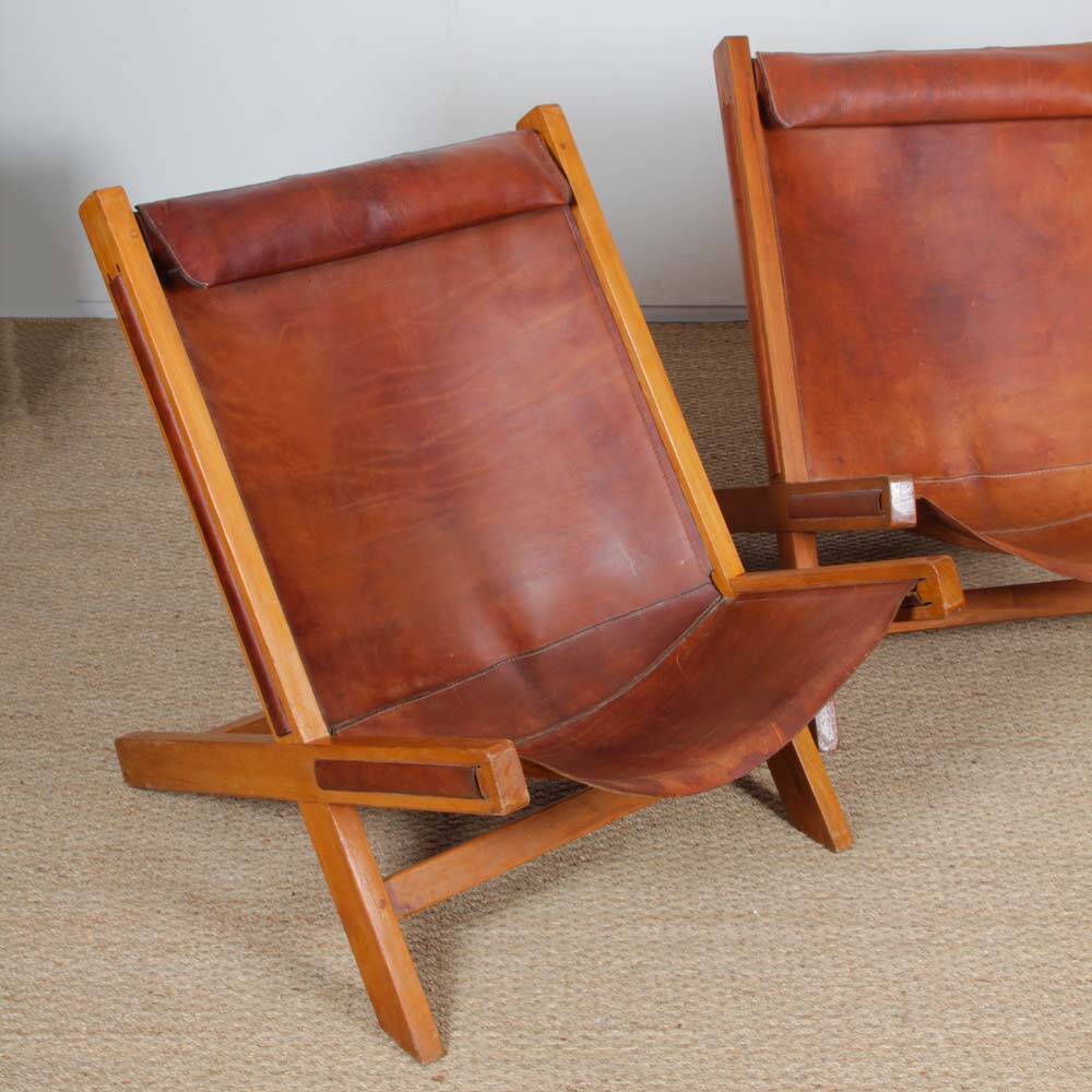 Pair of large wooden and leather armchairs from the 1980s