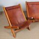 Pair of large wooden and leather armchairs from the 1980s