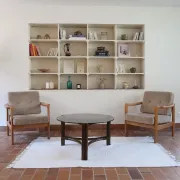 Round coffee table in rattan and smoked glass — 1970s