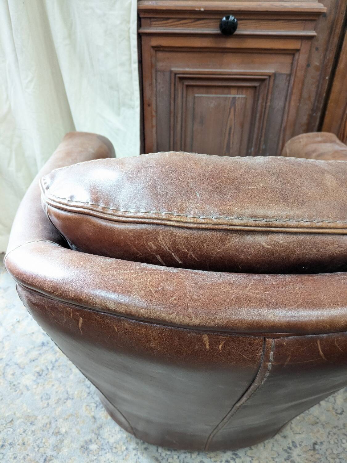 Pair of leather armchairs