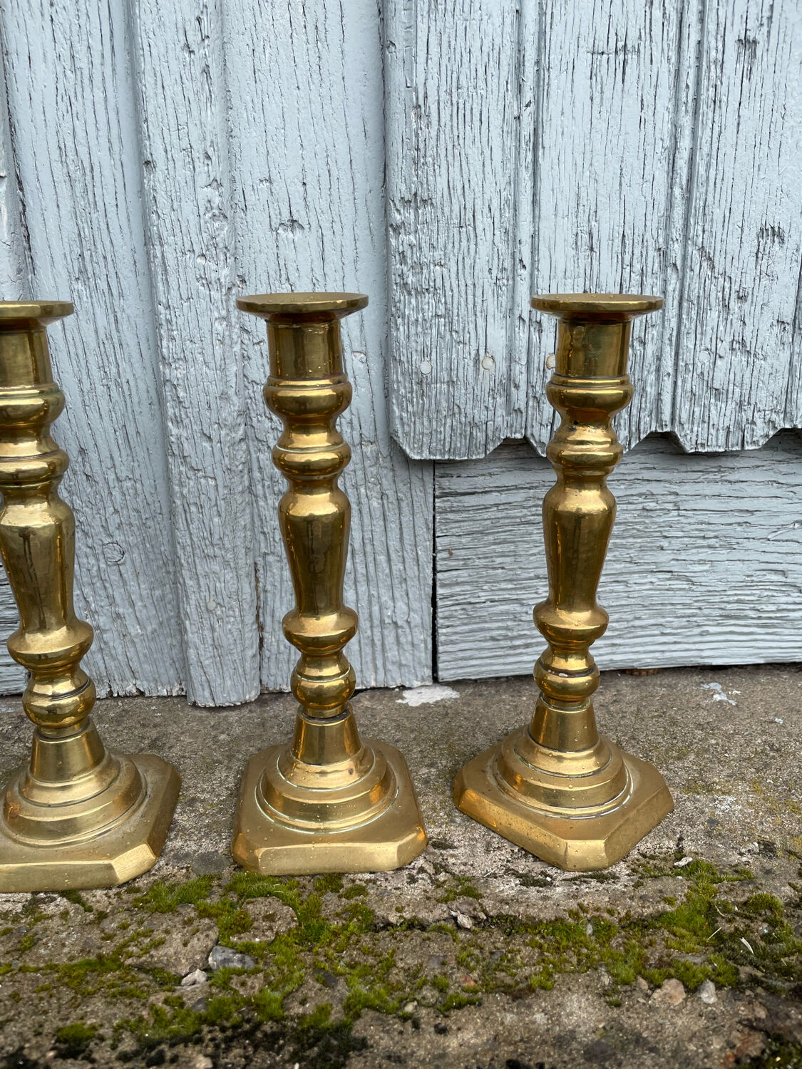 4 Victorian brass candlesticks