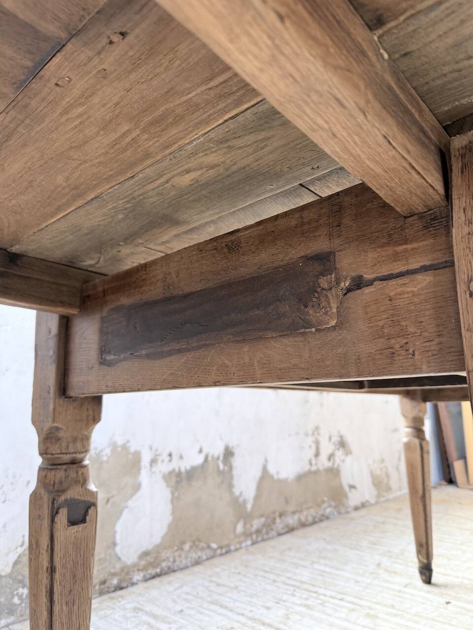 Solid oak farmhouse table with integrated extensions 1950