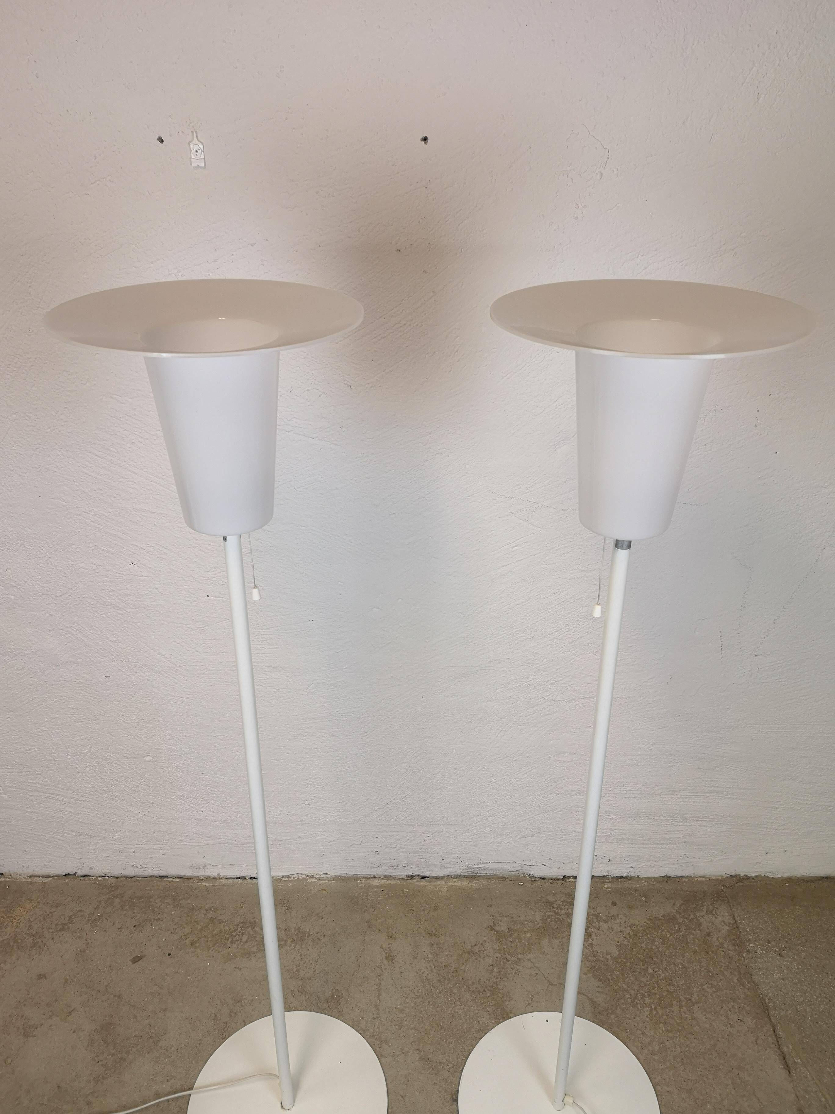Pair of mid-century modern Luxus floor lamps, Sweden, 1970s.
