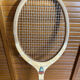 Vintage wooden tennis racket challenge sport