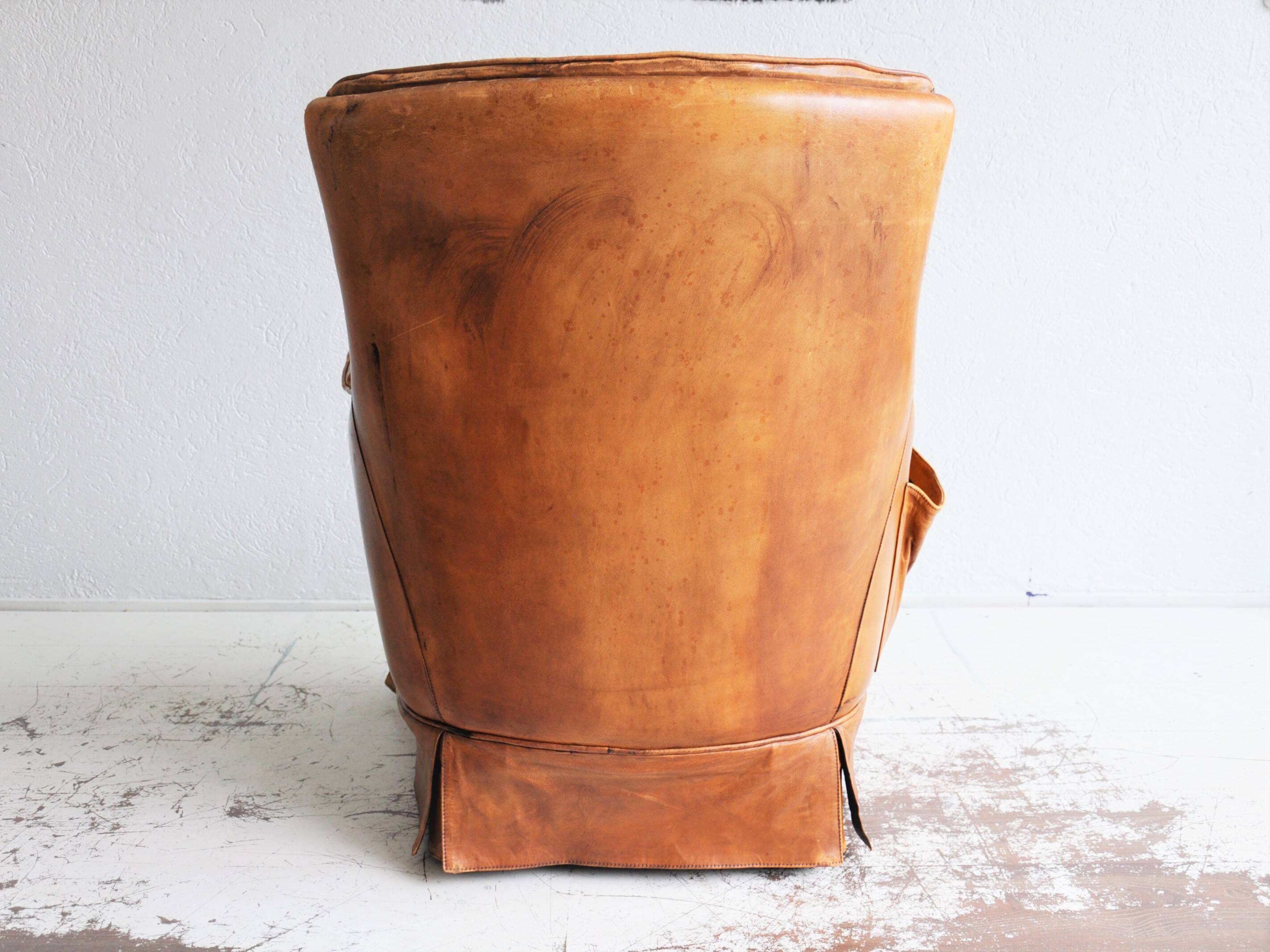 Vintage sheap leather armchair,  large smoker chair in brown sheapleather, Big leather fauteuil