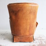 Vintage sheap leather armchair,  large smoker chair in brown sheapleather, Big leather fauteuil