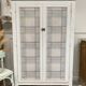 Armoire patinée en bois brut