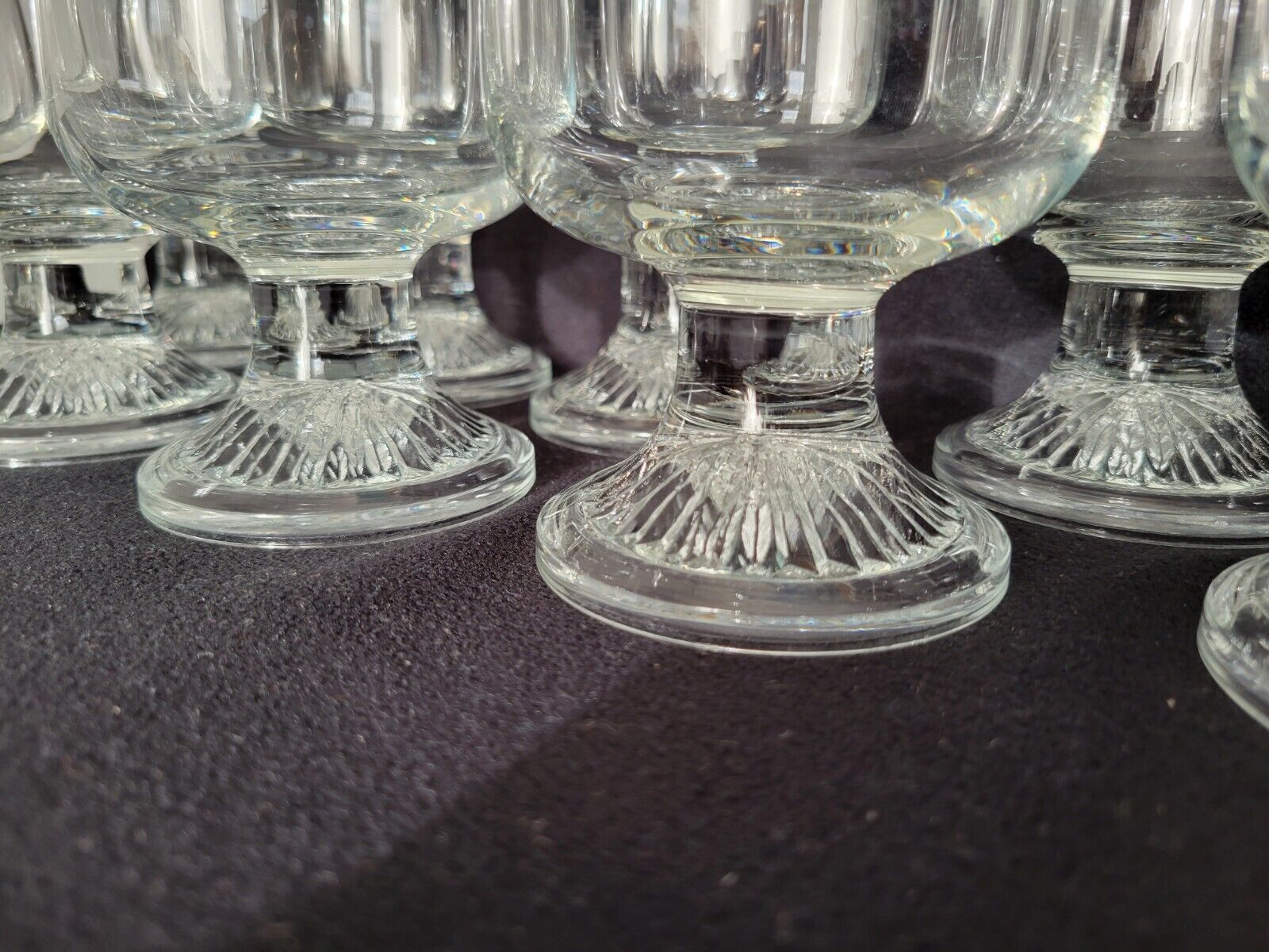 10 vintage stemmed glasses in molded glass
