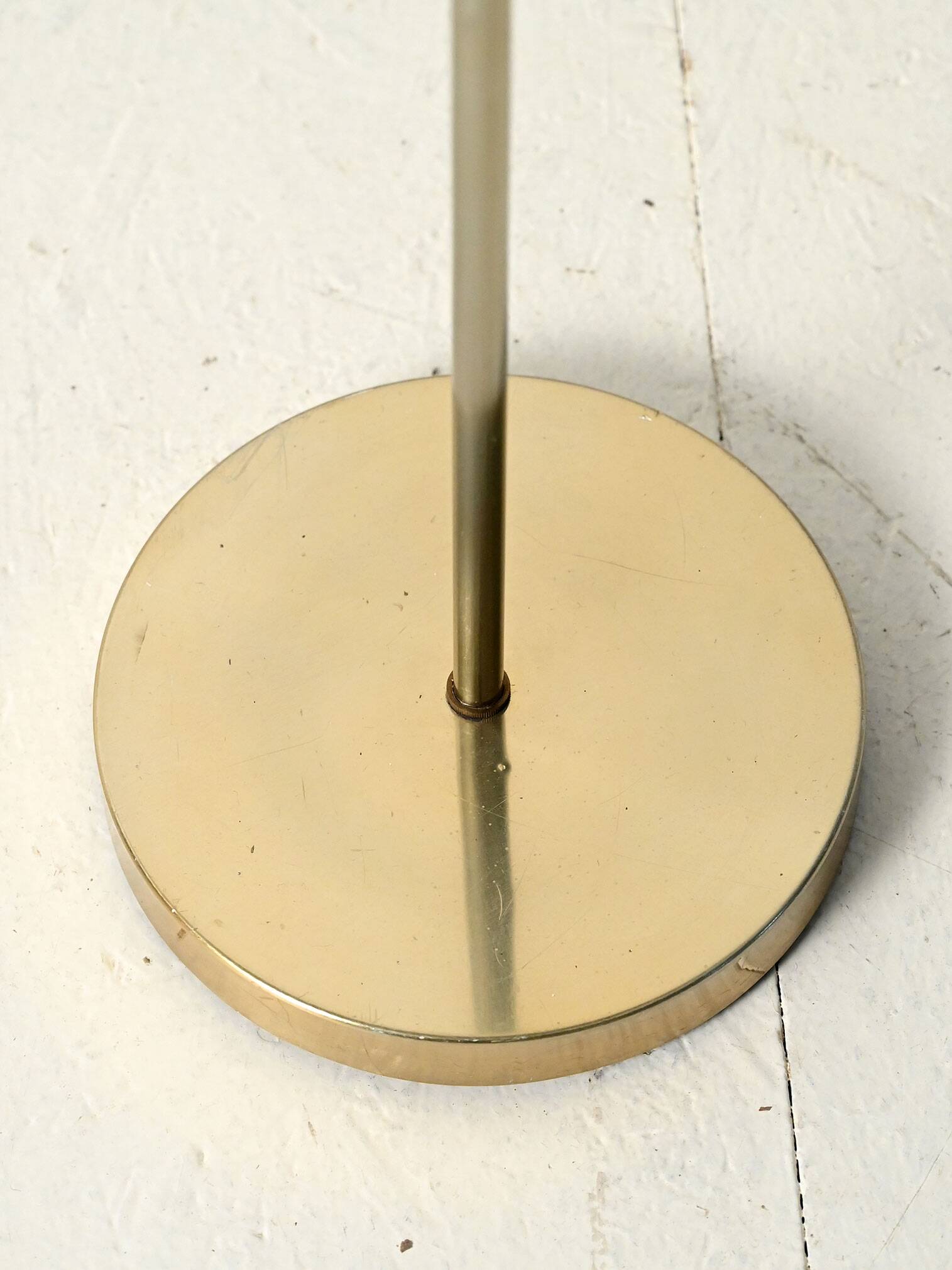Brass floor lamp with green leather