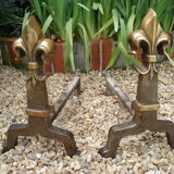 Pair of old chenets fleur de lys pattern