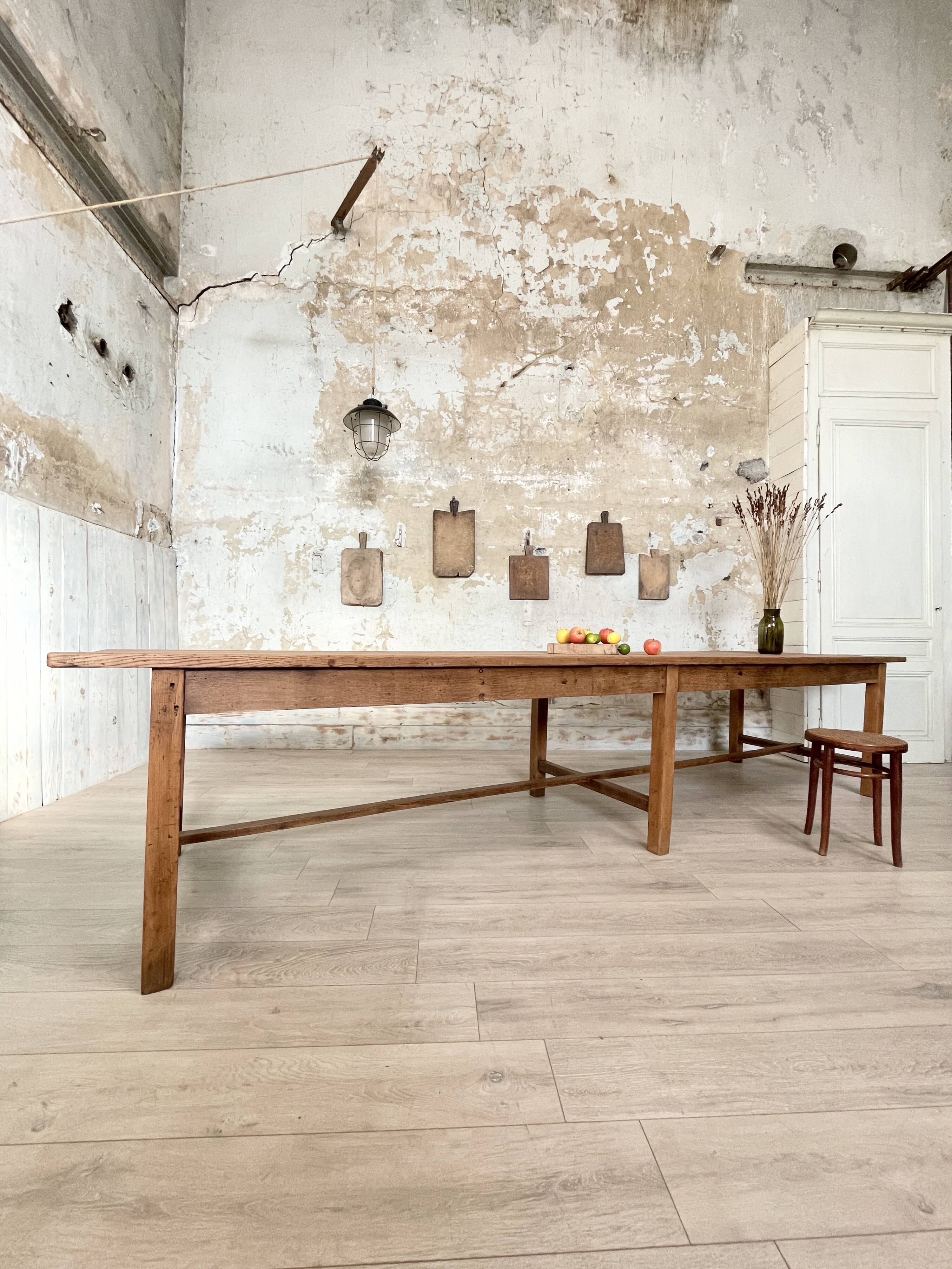 Solid wood workshop table with straight legs.