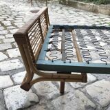 Twin rattan beds with built-in bedside tables