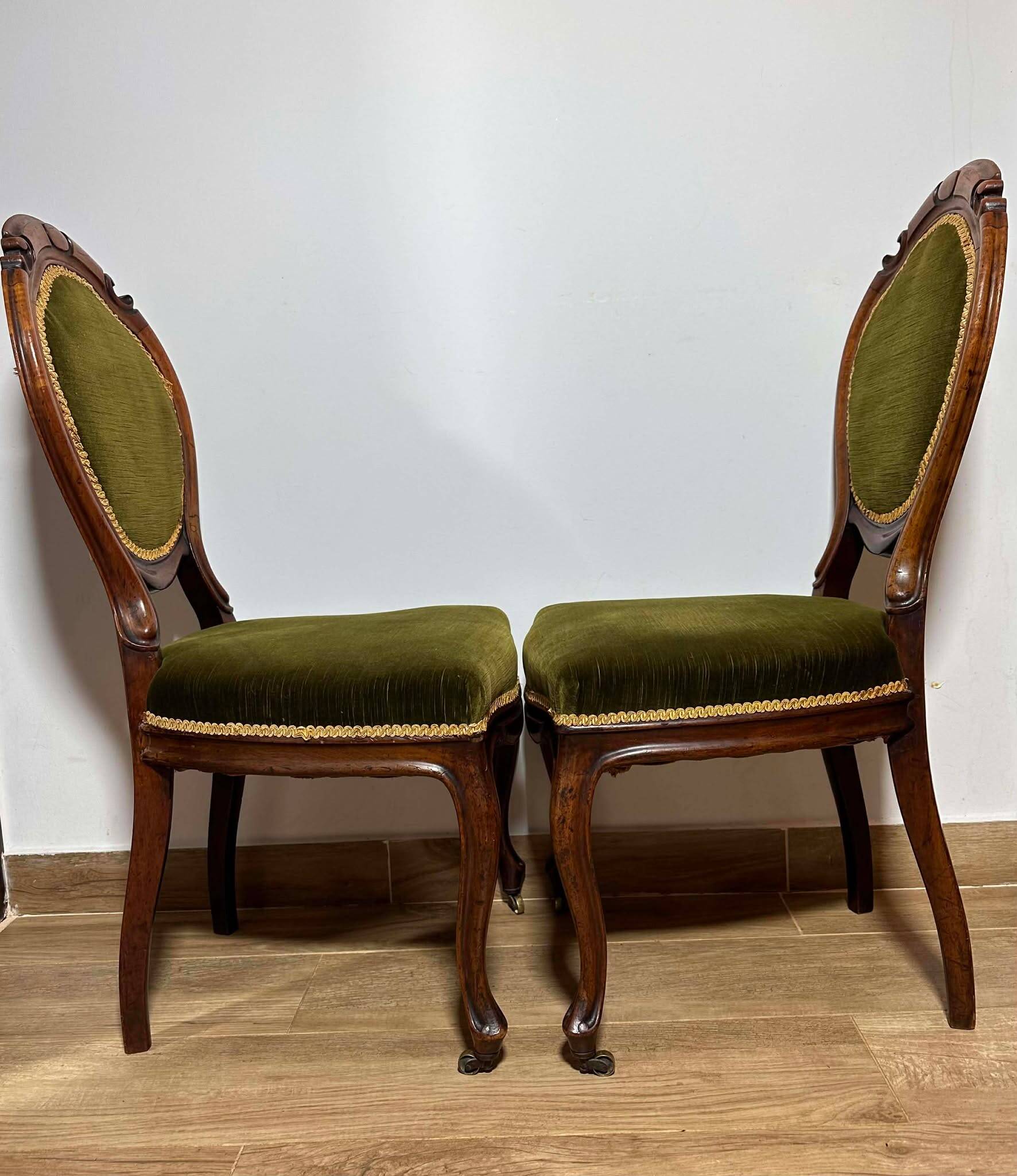 A pair of antique upholstered side chairs/Victorian balloon-back