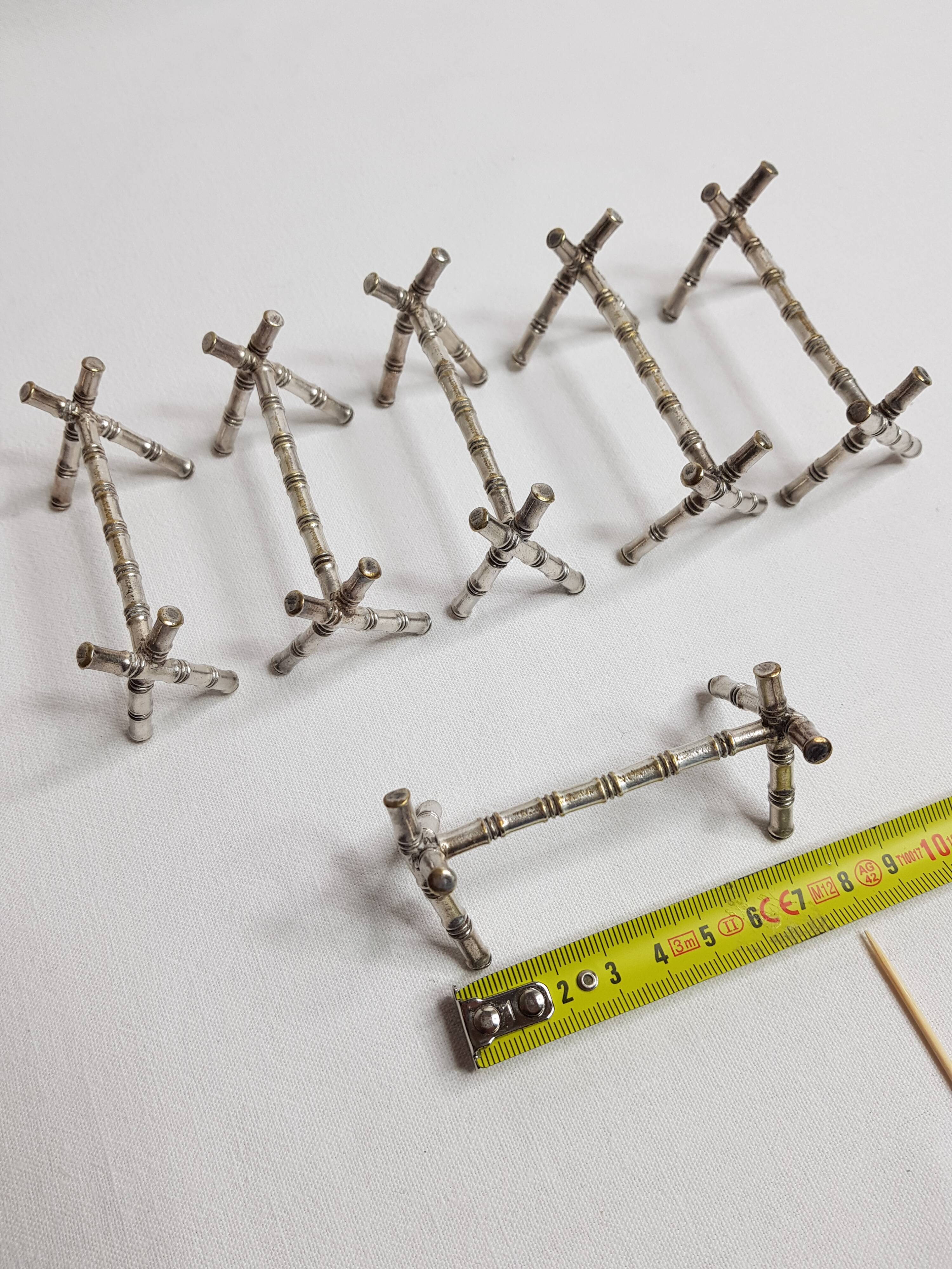 Set of six knife holders in silver metal in imitation of bamboo