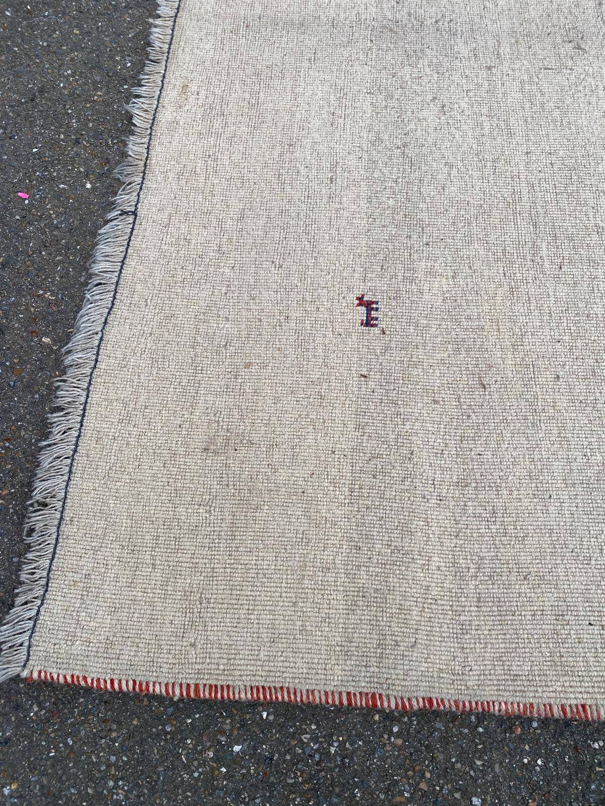 Vintage beige handwoven wool rug 175x235.