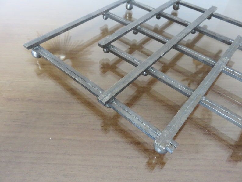 Extendable silver metal underside 40s 50s